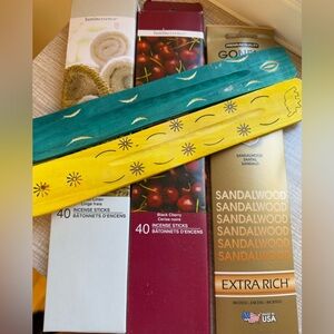 Vibrant Yellow and Green incense Holders with about 90 total incense sticks